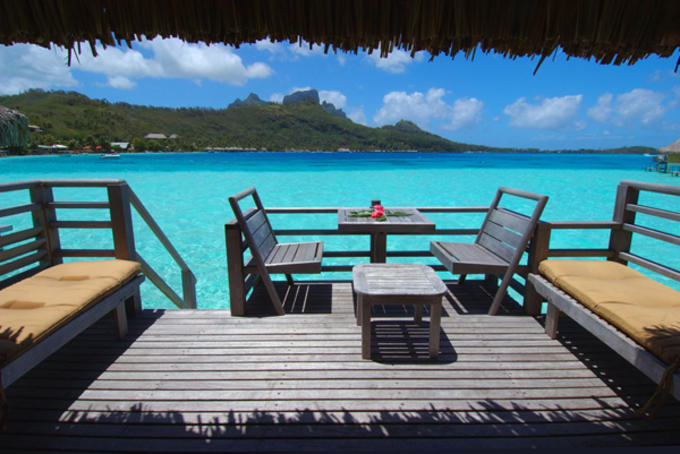 Horizon Overwater Bungalow sun deck with direct lagoon access at Le Moana